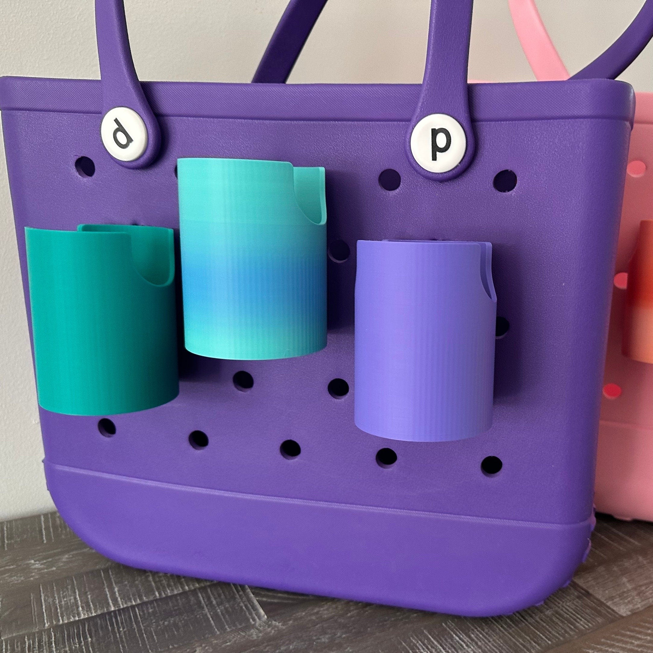 Tote with outlet cup holder